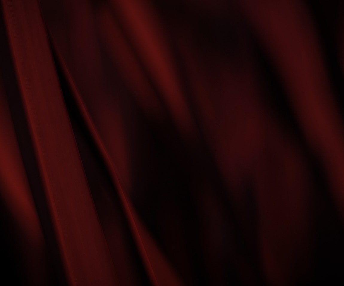 Abstract deep red fabric texture background.