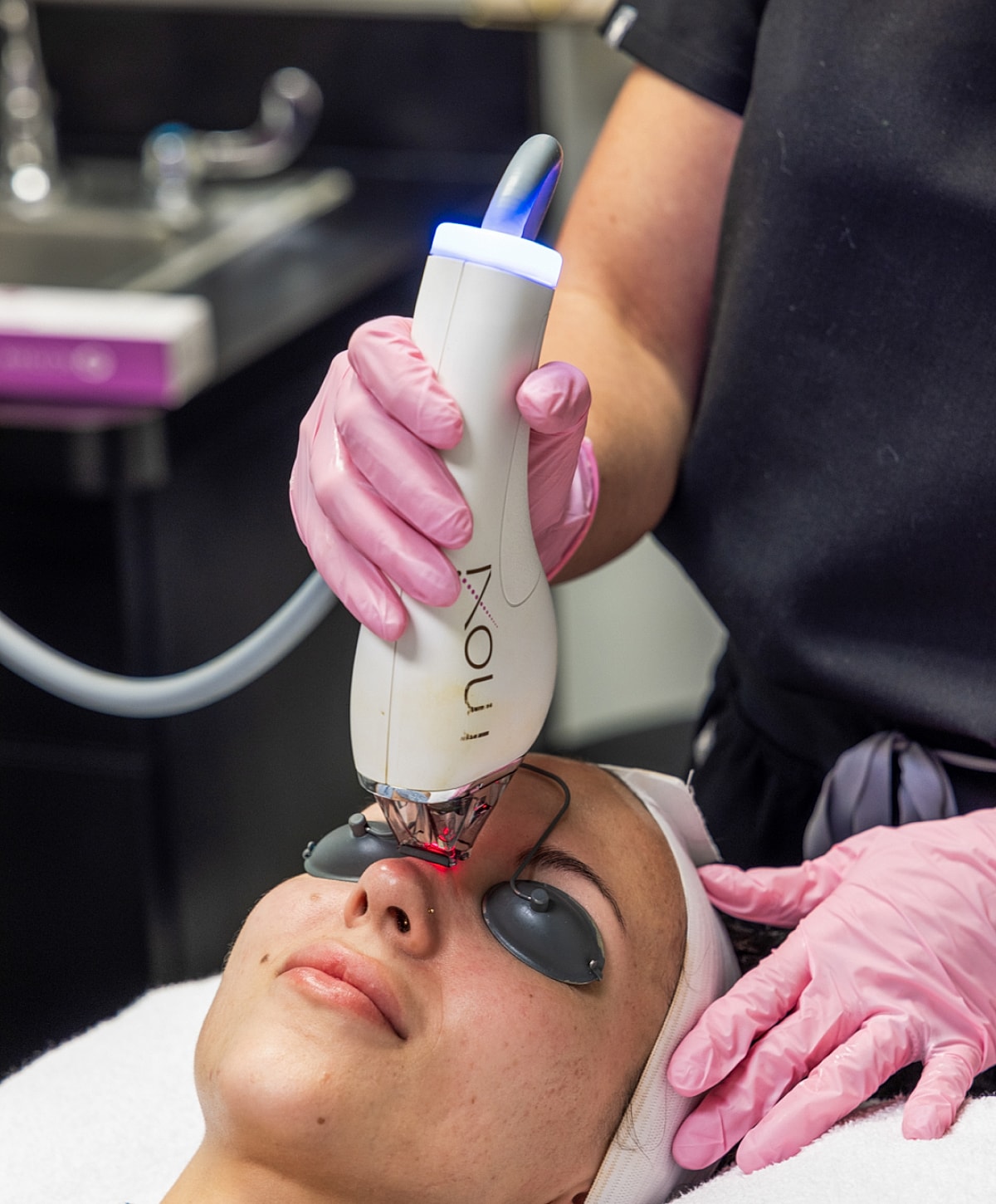 Laser treatment facial in a skincare clinic.