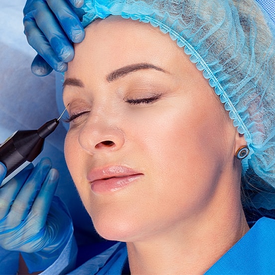 Cosmetic procedure on a woman's eye.