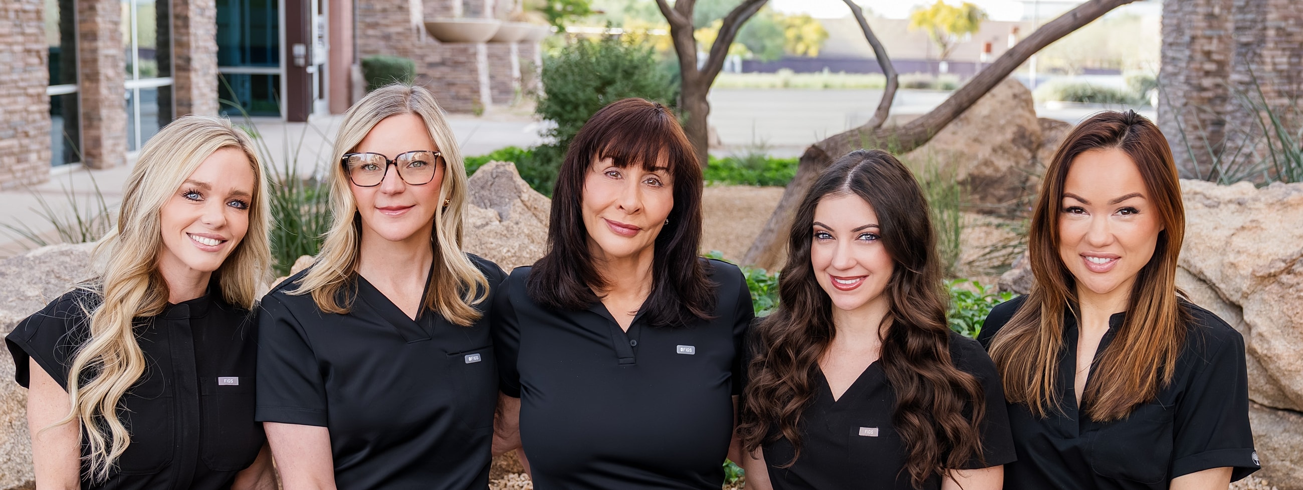 Blume Medspa Scottsdale providers standing in front of office smiling