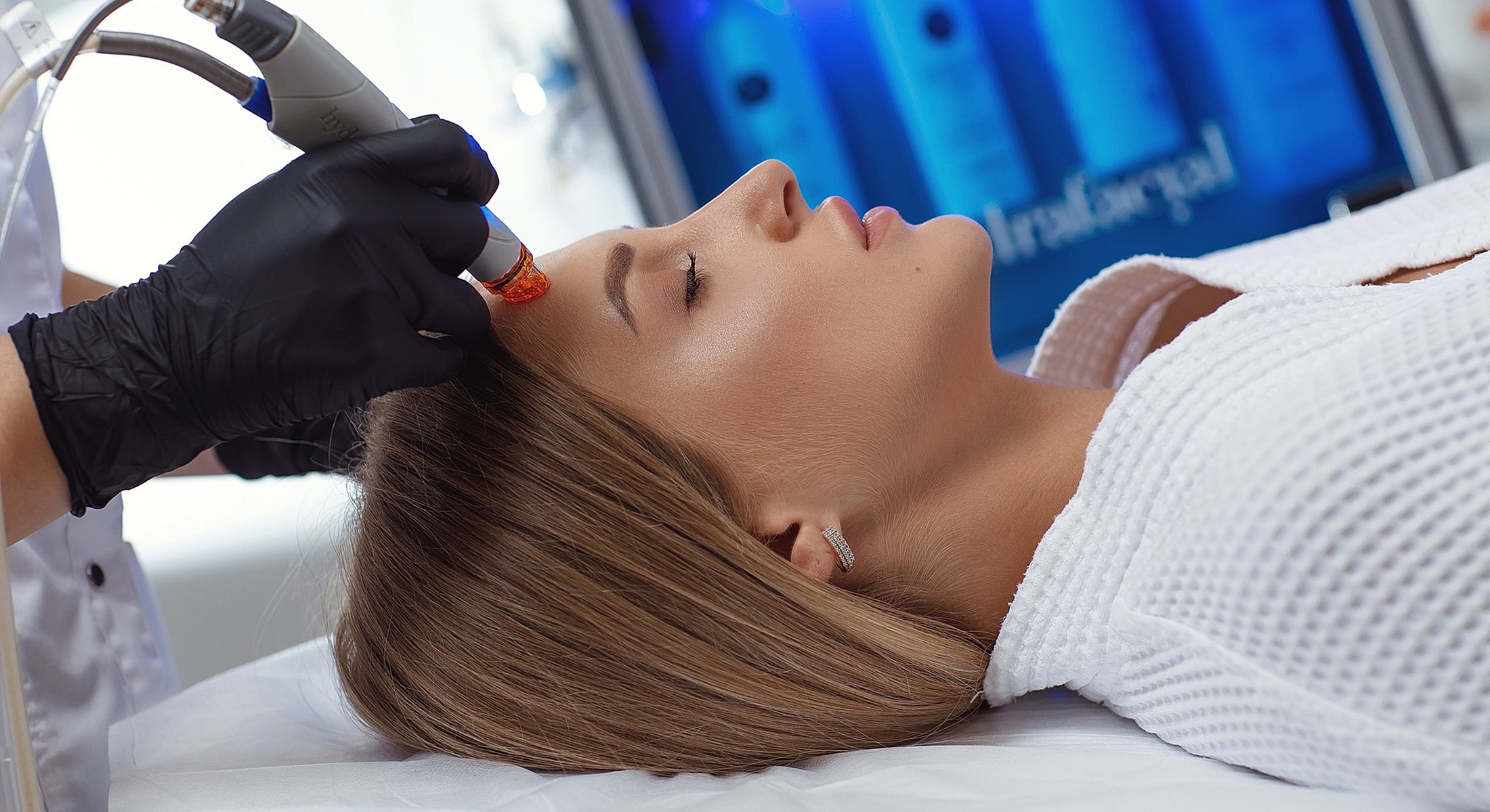 Hydrafacial treatment in a spa setting.