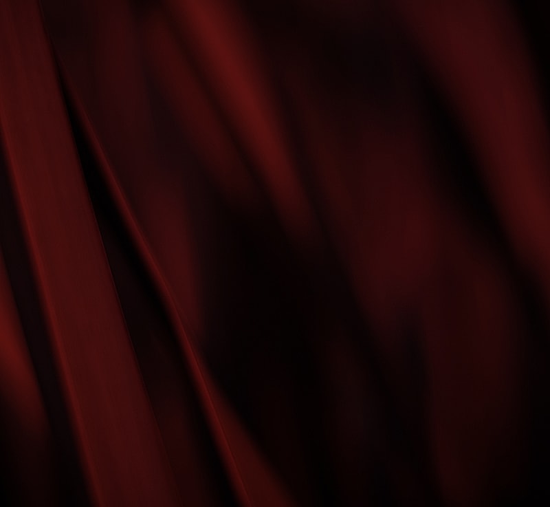 Close-up of flowing red fabric texture.